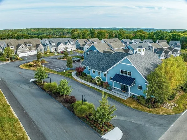 an aerial view of a house with a garden view