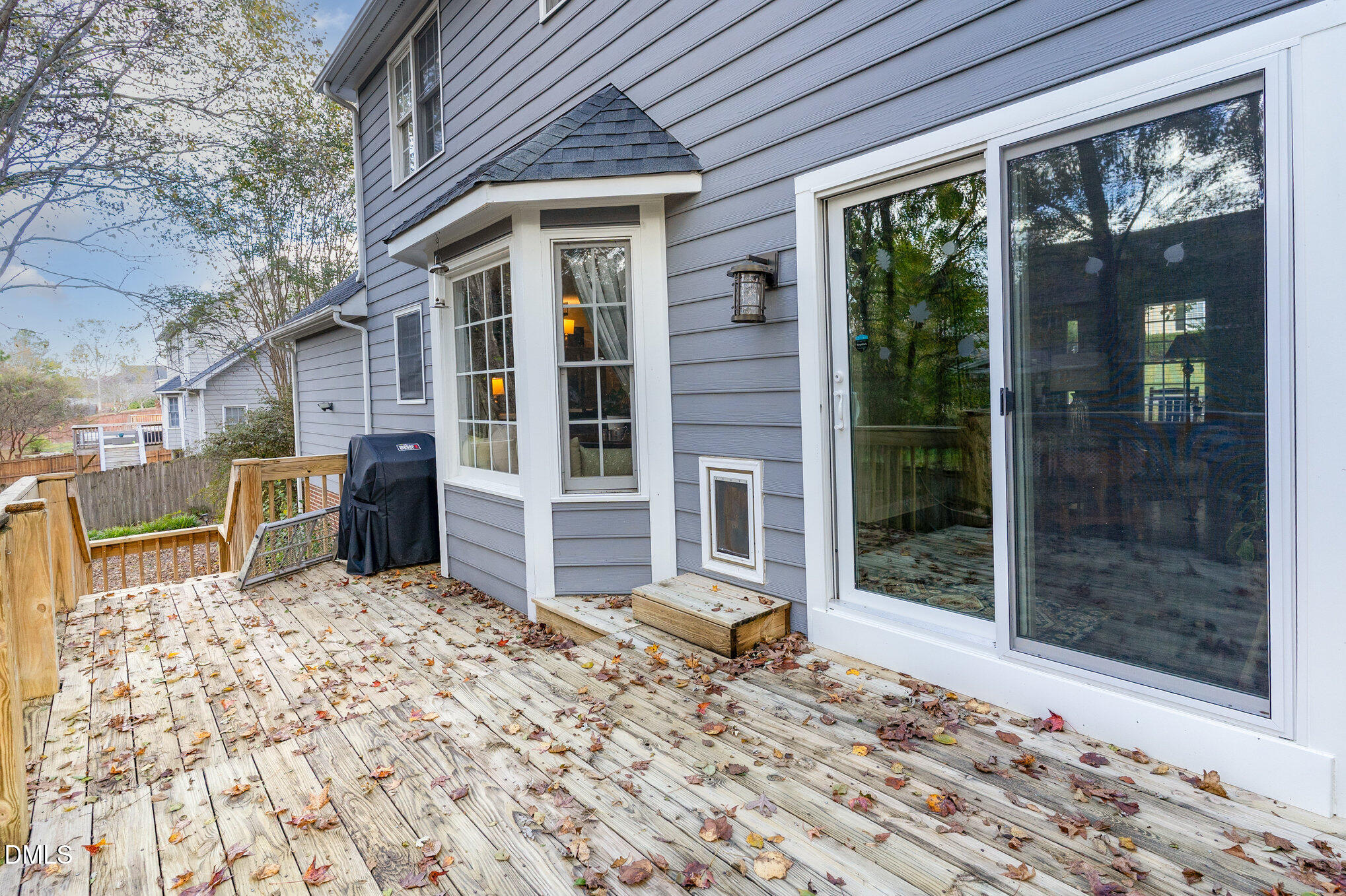 3205 Terrel Mill Road Raleigh, NC 27616 - Photo 18 of 26 a view of a porch with a bench in front of house