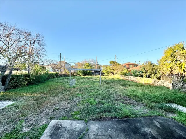 a view of a garden with an outdoor space