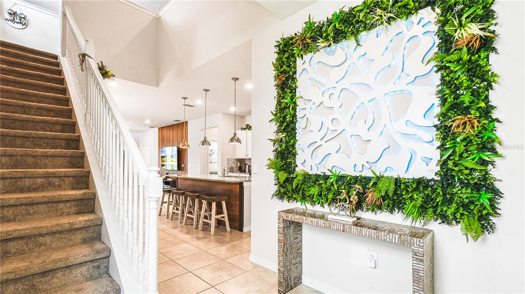 7219 Oakmoss Loop Davenport, FL 33837 - Photo 2 of 54 a view of entryway with outdoor area