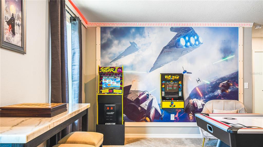 7219 Oakmoss Loop Davenport, FL 33837 - Photo 21 of 54 a very nice looking room with many windows and furniture