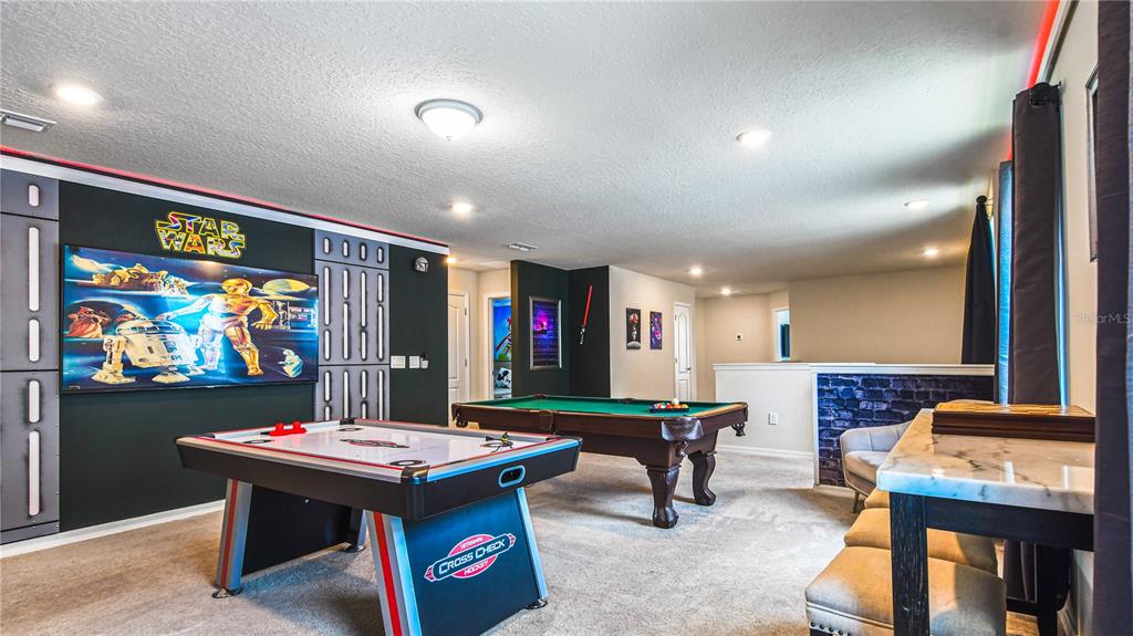 7219 Oakmoss Loop Davenport, FL 33837 - Photo 22 of 54 a room with furniture and pool table