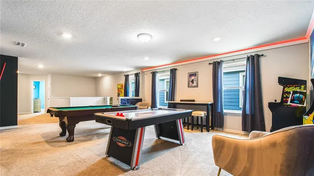 kids room with toys and wooden floor