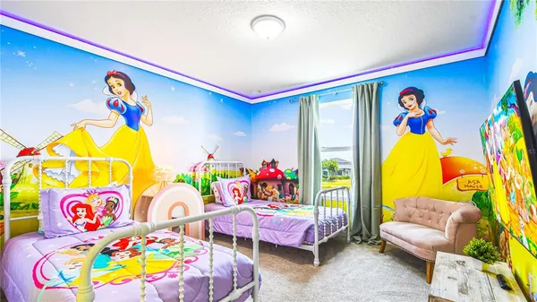 a living room filled with furniture and a couch