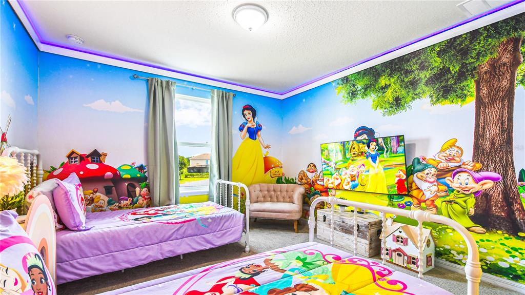 7219 Oakmoss Loop Davenport, FL 33837 - Photo 26 of 54 a living room filled with furniture and a couch