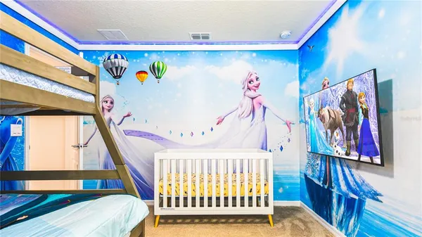 a room with toys and wall picture