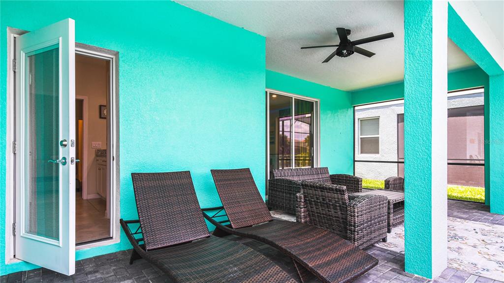 7219 Oakmoss Loop Davenport, FL 33837 - Photo 47 of 54 a living room with furniture and a window