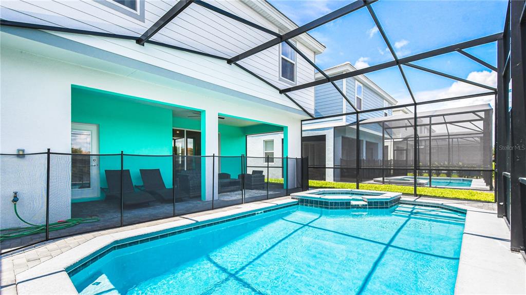 7219 Oakmoss Loop Davenport, FL 33837 - Photo 53 of 54 a view of swimming pool with patio