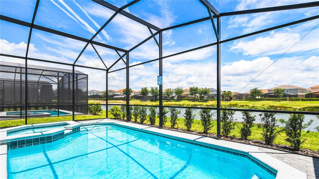 7219 Oakmoss Loop Davenport, FL 33837 - Photo 54 of 54 a view of swimming pool with a deck