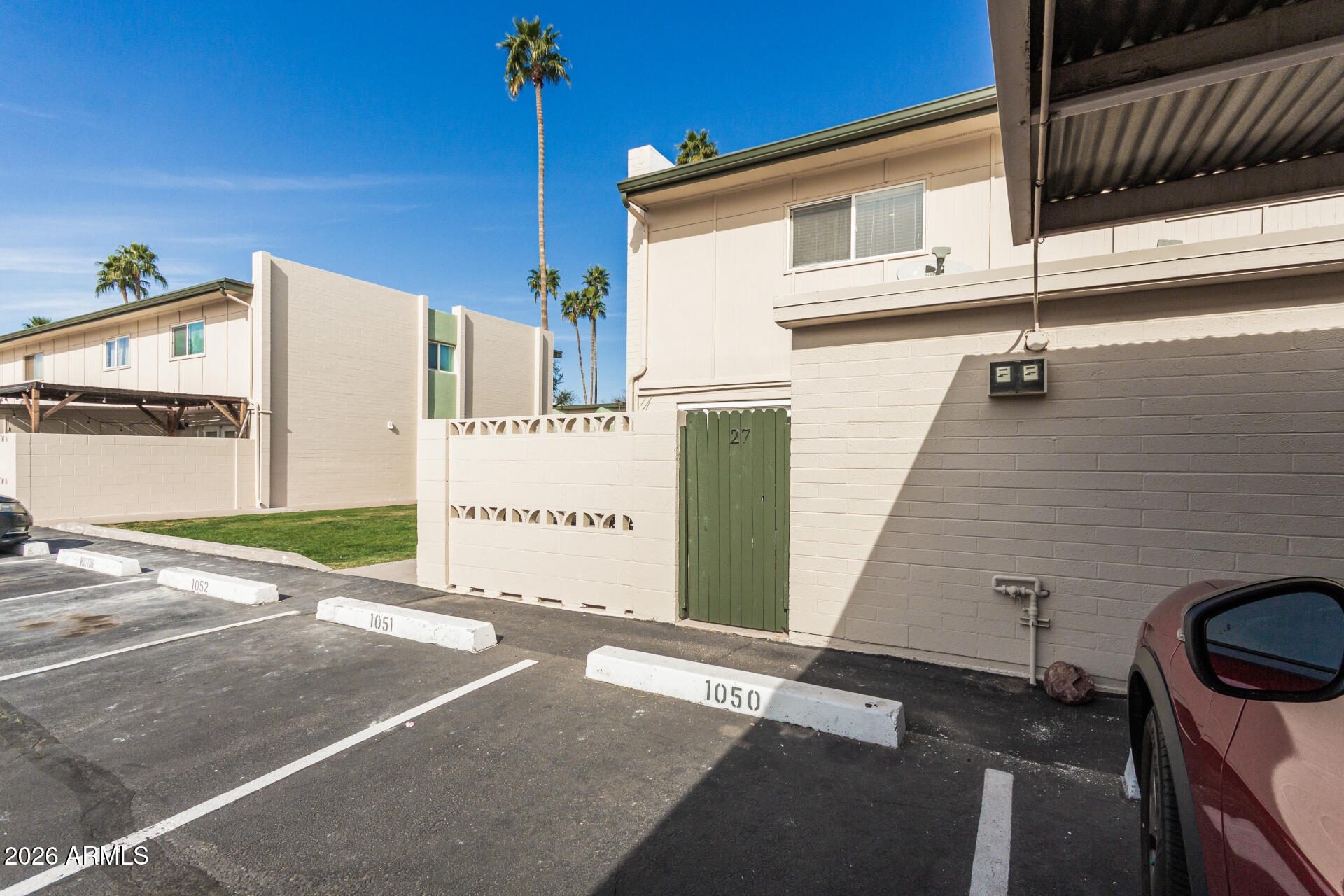 6040 North 15th Street, Unit 27 Phoenix, AZ 85014 - Photo 23 of 28 a view of a house with a street
