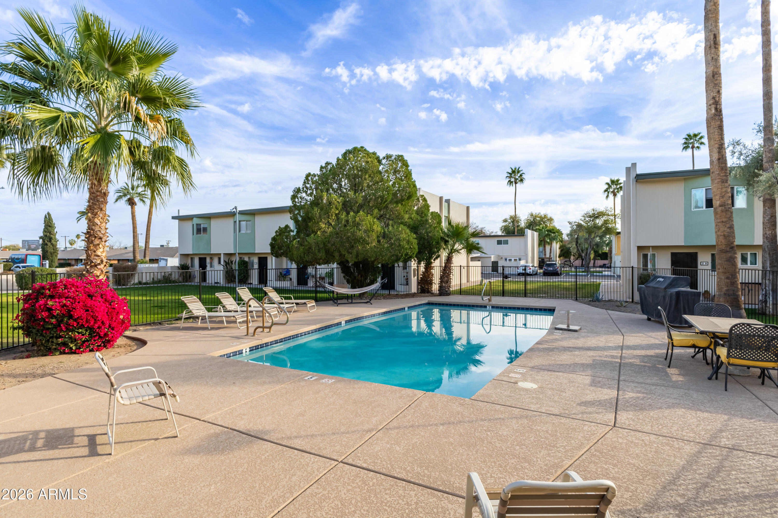 6040 North 15th Street, Unit 27 Phoenix, AZ 85014 - Photo 27 of 28 a view of a backyard with sitting area