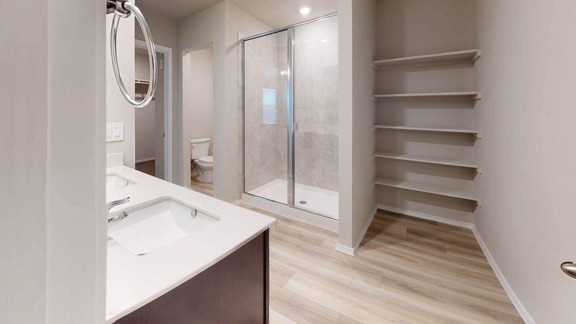 561 Hector Loop Georgetown, TX 78626 - Photo 19 of 30 a bathroom with a shower and a sink