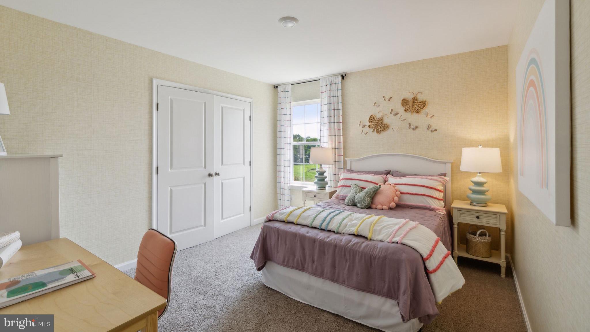 453 Clems Run Mullica Hill, NJ 08062 - Photo 19 of 35 a bedroom with a bed and a couch