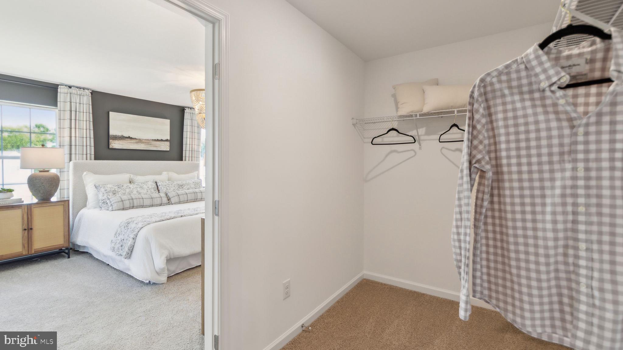 453 Clems Run Mullica Hill, NJ 08062 - Photo 26 of 35 a bedroom with a bed and a window