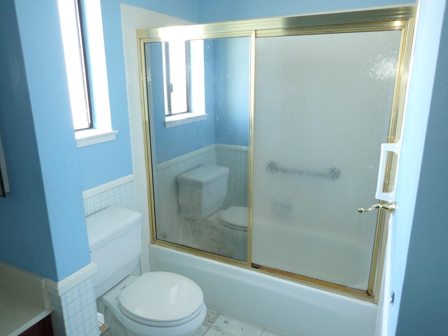 1955 Redwood Road Hercules, CA 94547 - Photo 15 of 23 a bathroom with a toilet and a shower