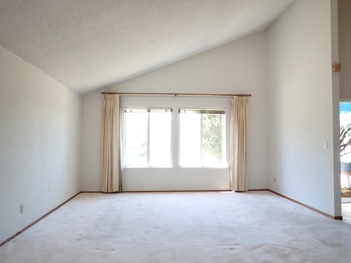 1955 Redwood Road Hercules, CA 94547 - Photo 5 of 23 an empty room with a window
