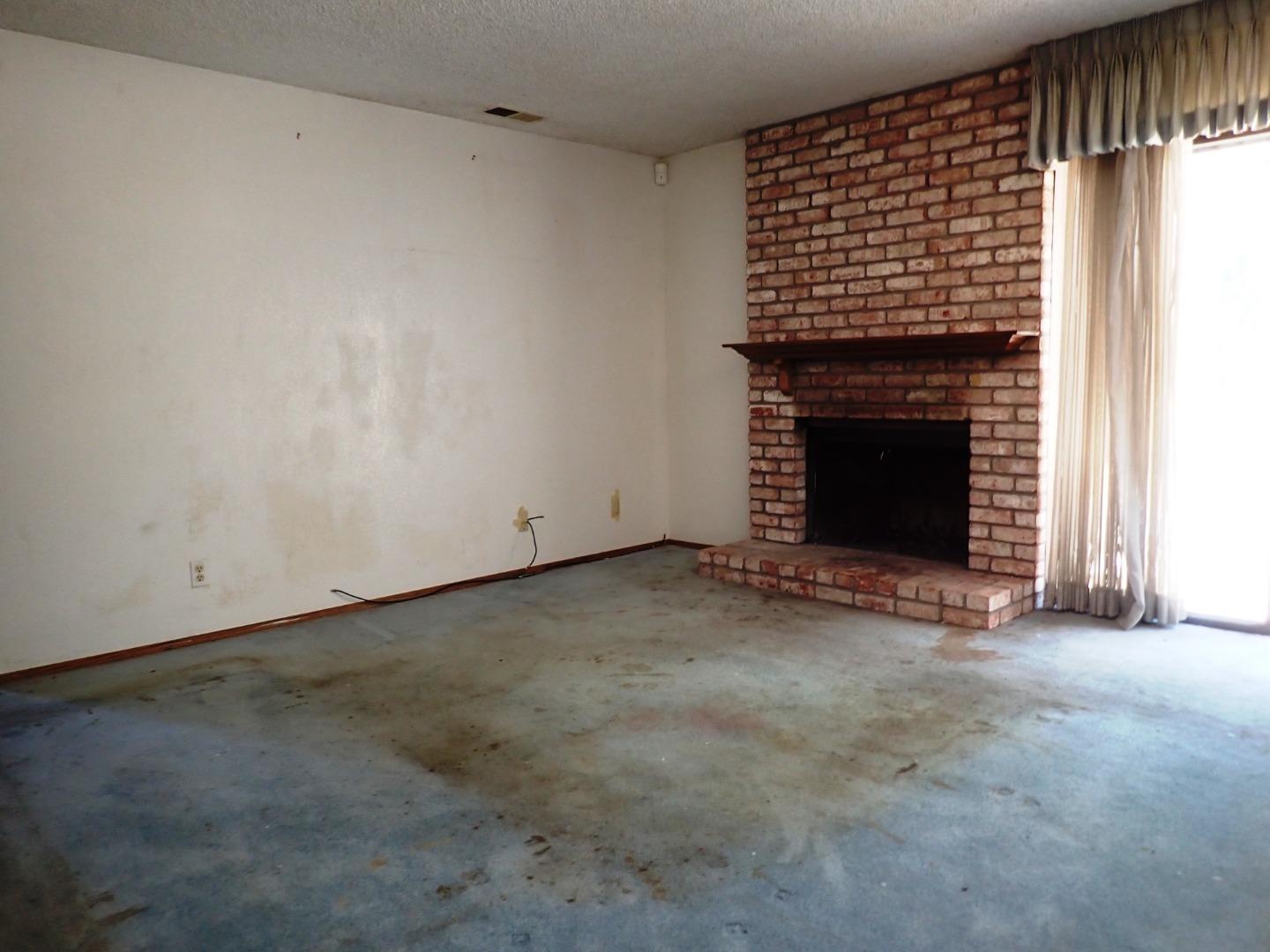 1955 Redwood Road Hercules, CA 94547 - Photo 8 of 23 a view of empty room with fireplace