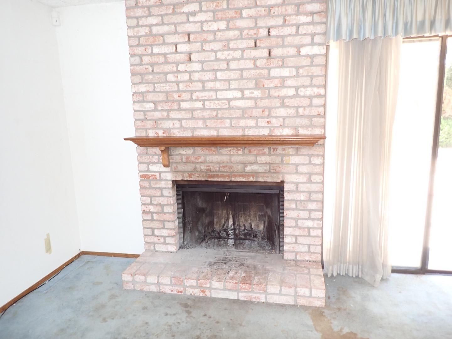 1955 Redwood Road Hercules, CA 94547 - Photo 9 of 23 a living room with a fireplace