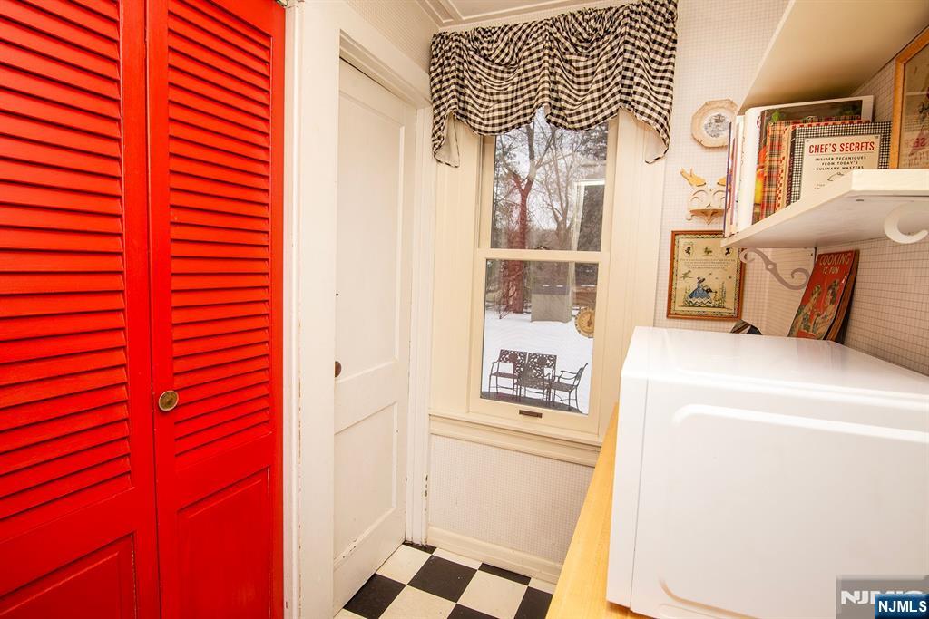 25 Maple Avenue Demarest, NJ 07627 - Photo 16 of 29 a utility room with dryer and washer