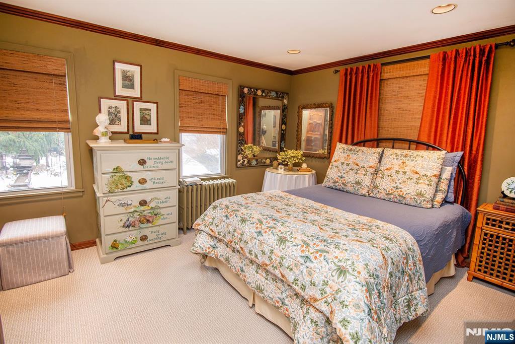 25 Maple Avenue Demarest, NJ 07627 - Photo 17 of 29 a bedroom with a bed and a window