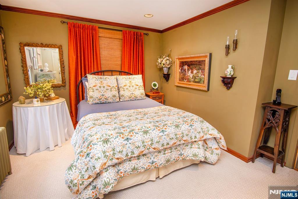 25 Maple Avenue Demarest, NJ 07627 - Photo 18 of 29 a bedroom with a bed and a large window