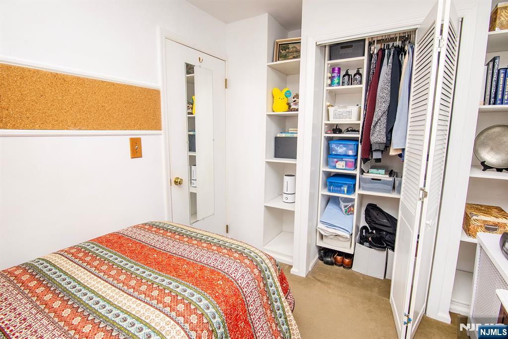 25 Maple Avenue Demarest, NJ 07627 - Photo 21 of 29 a bedroom with a bed and a closet