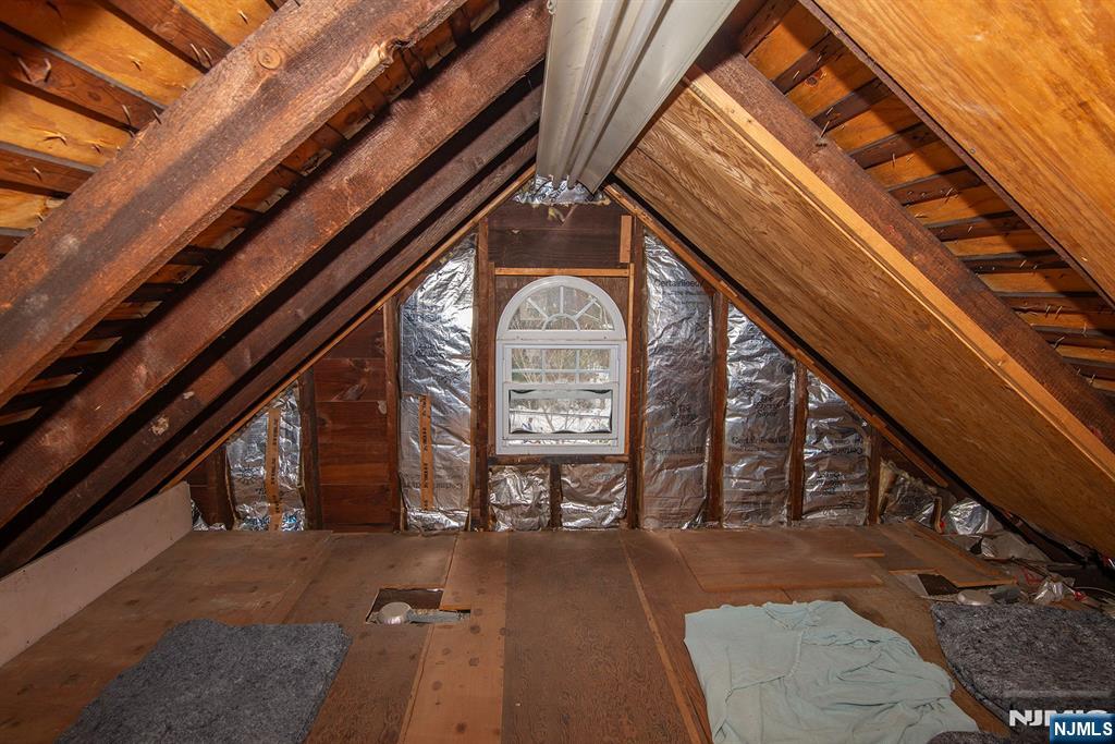 25 Maple Avenue Demarest, NJ 07627 - Photo 24 of 29 a view of a hallway with wooden floor and staircase