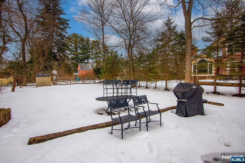 25 Maple Avenue Demarest, NJ 07627 - Photo 27 of 29 a view of a patio with swimming pool