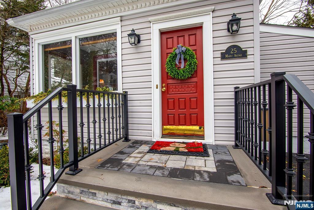 25 Maple Avenue Demarest, NJ 07627 - Photo 4 of 29 a view of a house with a door and a porch