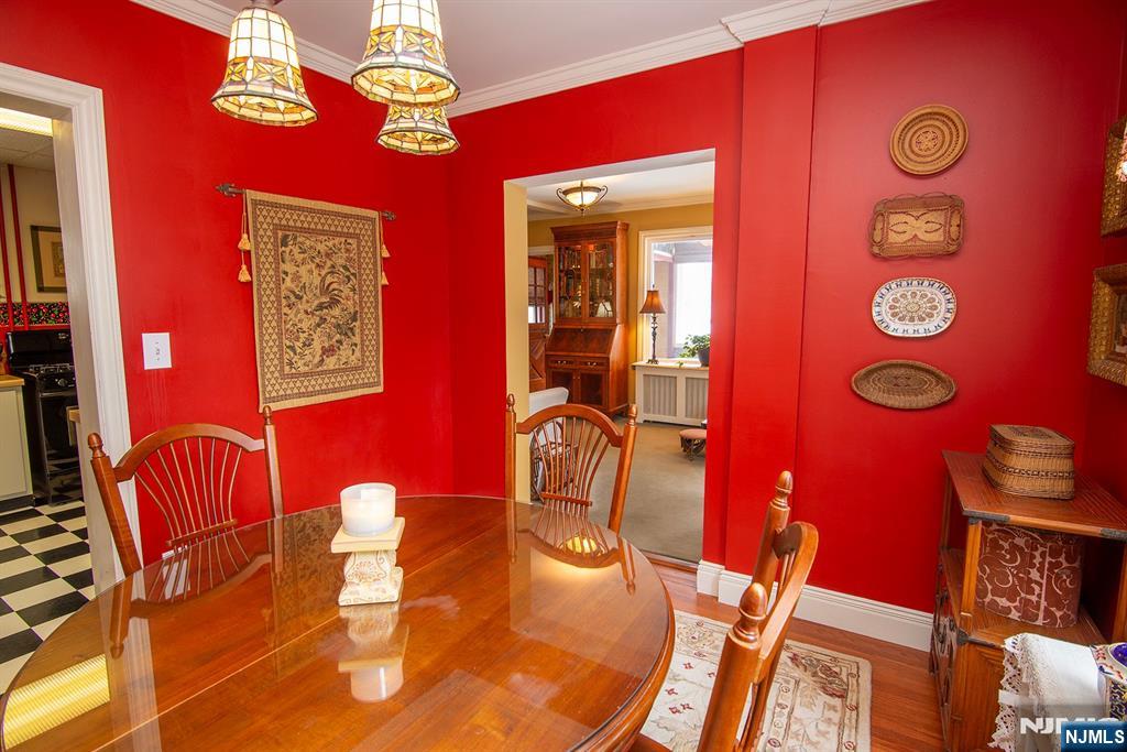 25 Maple Avenue Demarest, NJ 07627 - Photo 9 of 29 a view of a dining room with furniture and chandelier
