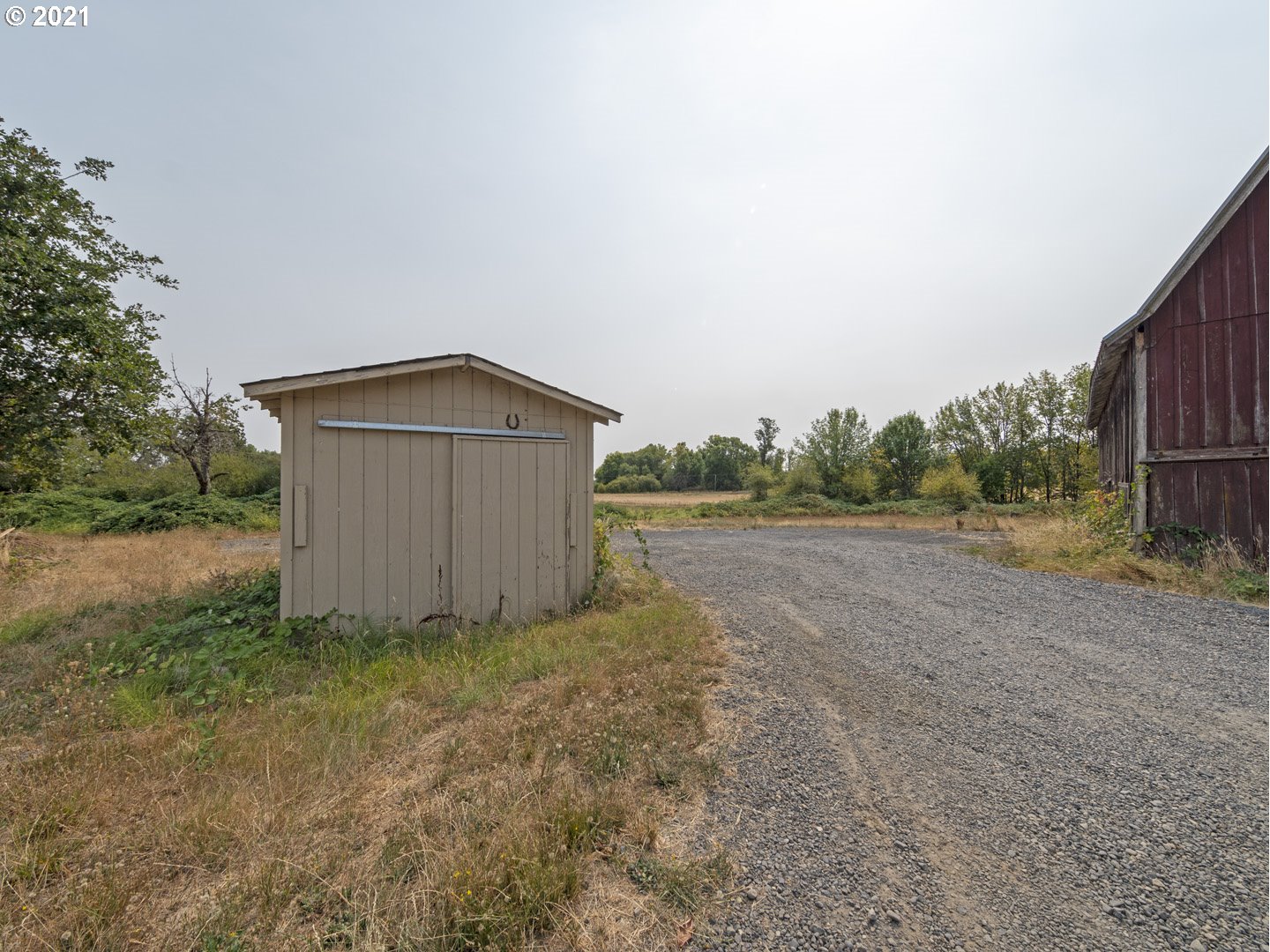 39600 Northwest Sunset Highway Banks, OR 97106 - Photo 7 of 10 a backyard of a house with lots of green space