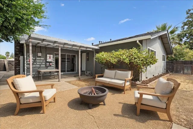 a outdoor living space with furniture and garden view