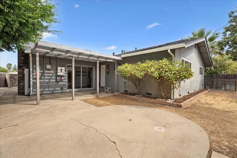 front view of a house with a big yard