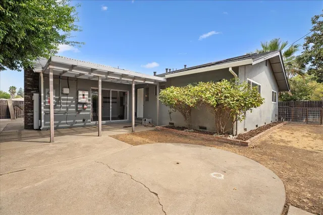 front view of a house with a big yard