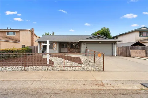 front view of a house with a street