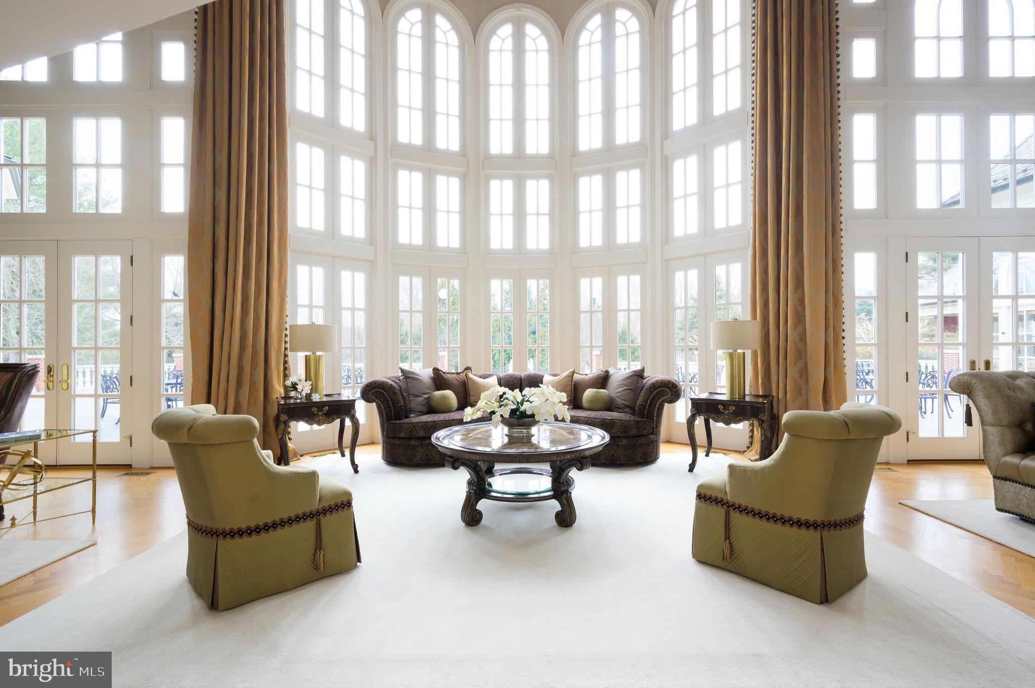 11510 Highland Farm Road Potomac, MD 20854 - Photo 14 of 50 Curved Wall of Floor-to-Ceiling Windows