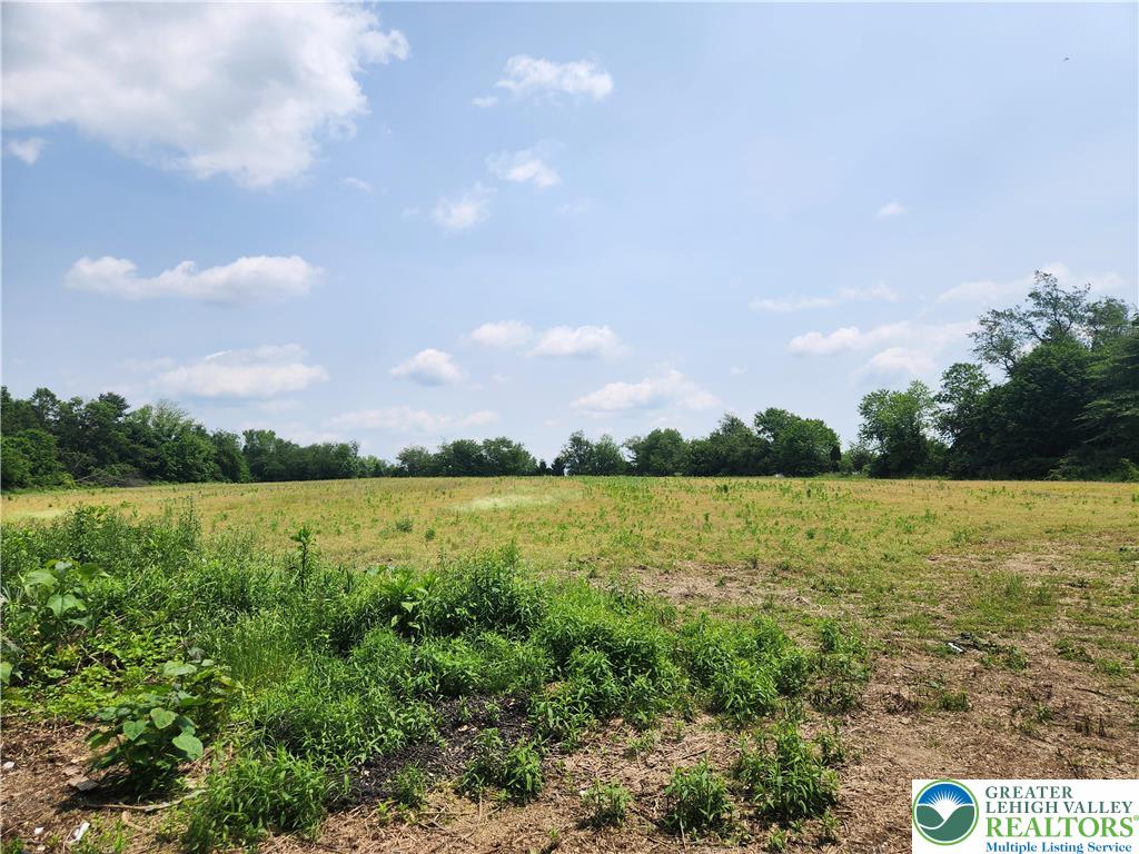 717 Point Phillips Road Bath, PA 18014 - Photo 16 of 34 a view of a lake with houses in the back