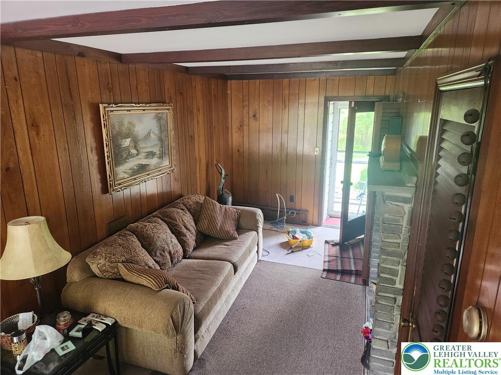 717 Point Phillips Road Bath, PA 18014 - Photo 21 of 34 a living room with furniture and a window