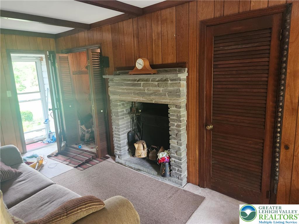 717 Point Phillips Road Bath, PA 18014 - Photo 22 of 34 a living room with furniture and a fireplace
