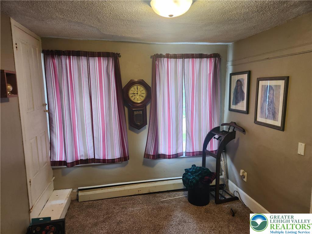 717 Point Phillips Road Bath, PA 18014 - Photo 29 of 34 a view of a door and chair in a room