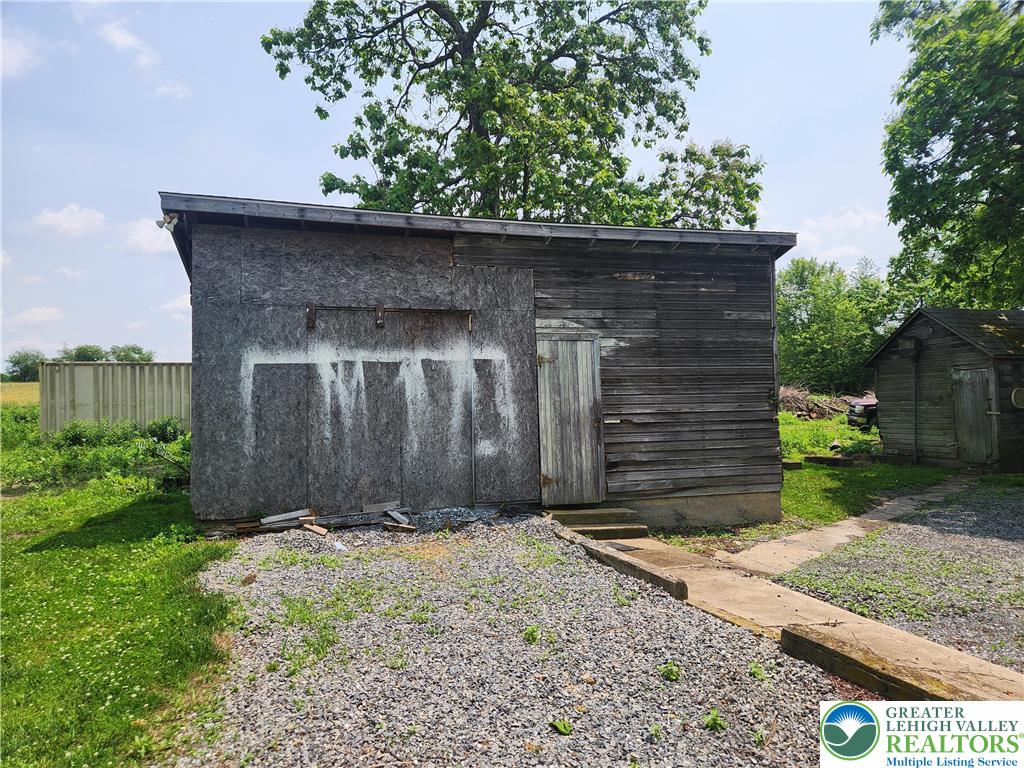 717 Point Phillips Road Bath, PA 18014 - Photo 34 of 34 a front view of a house with a yard