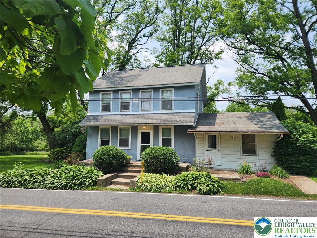 717 Point Phillips Road Bath, PA 18014 - Photo 5 of 34 front view of a house with a yard