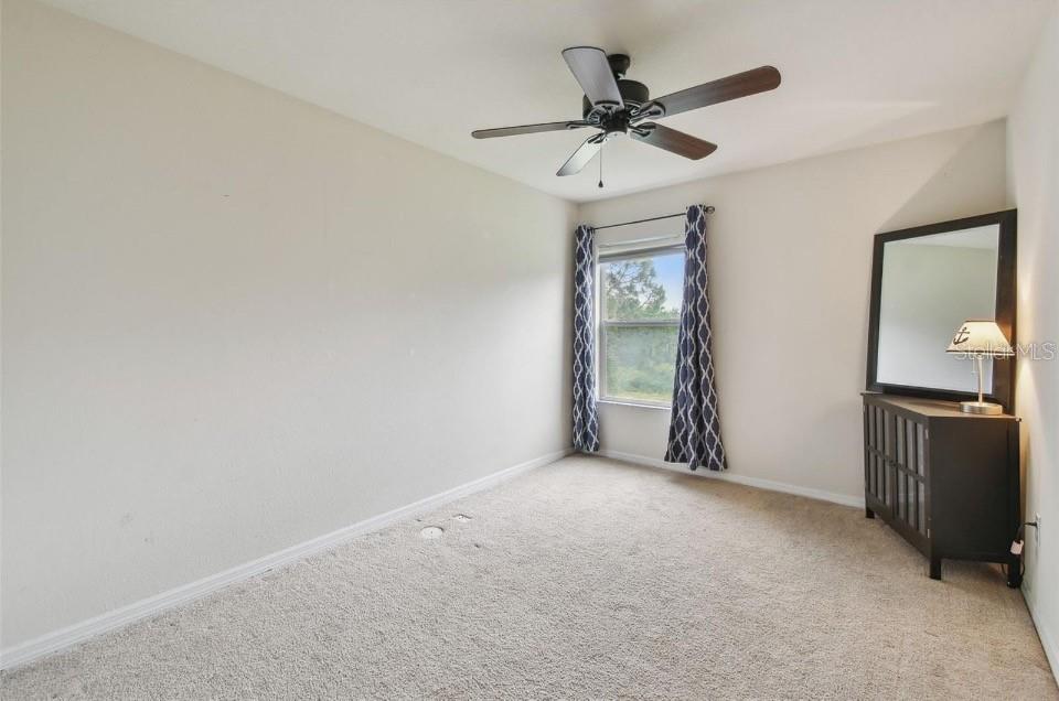 11523 84th St Circle East, Unit 106 Parrish, FL 34219 - Photo 18 of 27 a view of a livingroom with a ceiling fan