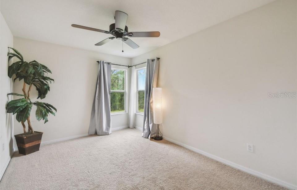 11523 84th St Circle East, Unit 106 Parrish, FL 34219 - Photo 19 of 27 a view of a livingroom with a potted plant