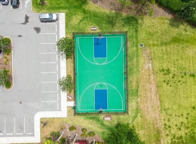 a view of a swimming pool with sitting area