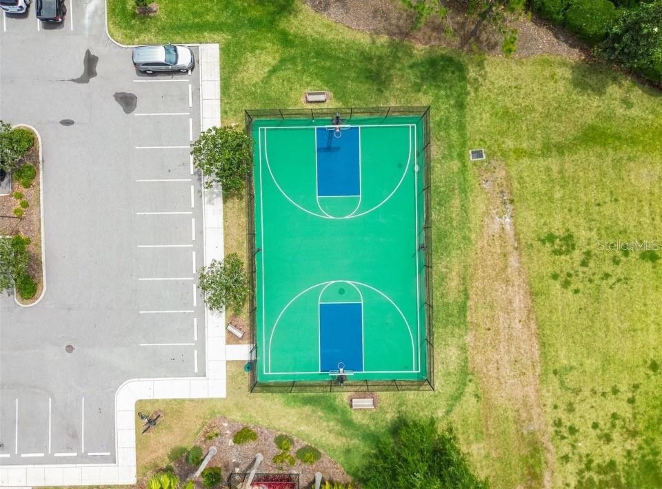 11523 84th St Circle East, Unit 106 Parrish, FL 34219 - Photo 23 of 27 a view of a door with a fountain and plants