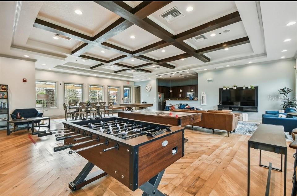 11523 84th St Circle East, Unit 106 Parrish, FL 34219 - Photo 25 of 27 a kitchen with stainless steel appliances granite countertop a stove and a view of living room