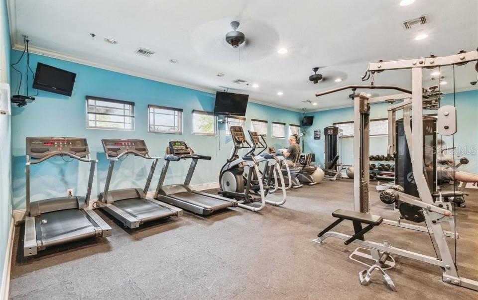 11523 84th St Circle East, Unit 106 Parrish, FL 34219 - Photo 26 of 27 a view of a room with gym equipment