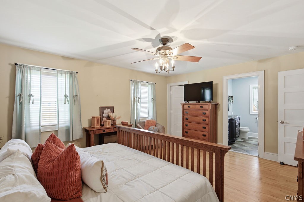 321 West Lake Road Oswego, NY 13126 - Photo 30 of 49 Spacious primary suite featuring hardwood floors,