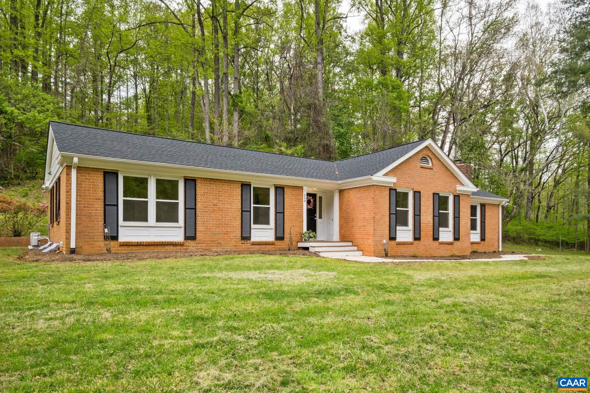 1680 Craigs Store Road Afton, VA 22920 - Photo 57 of 57 a front view of a house with a yard and trees